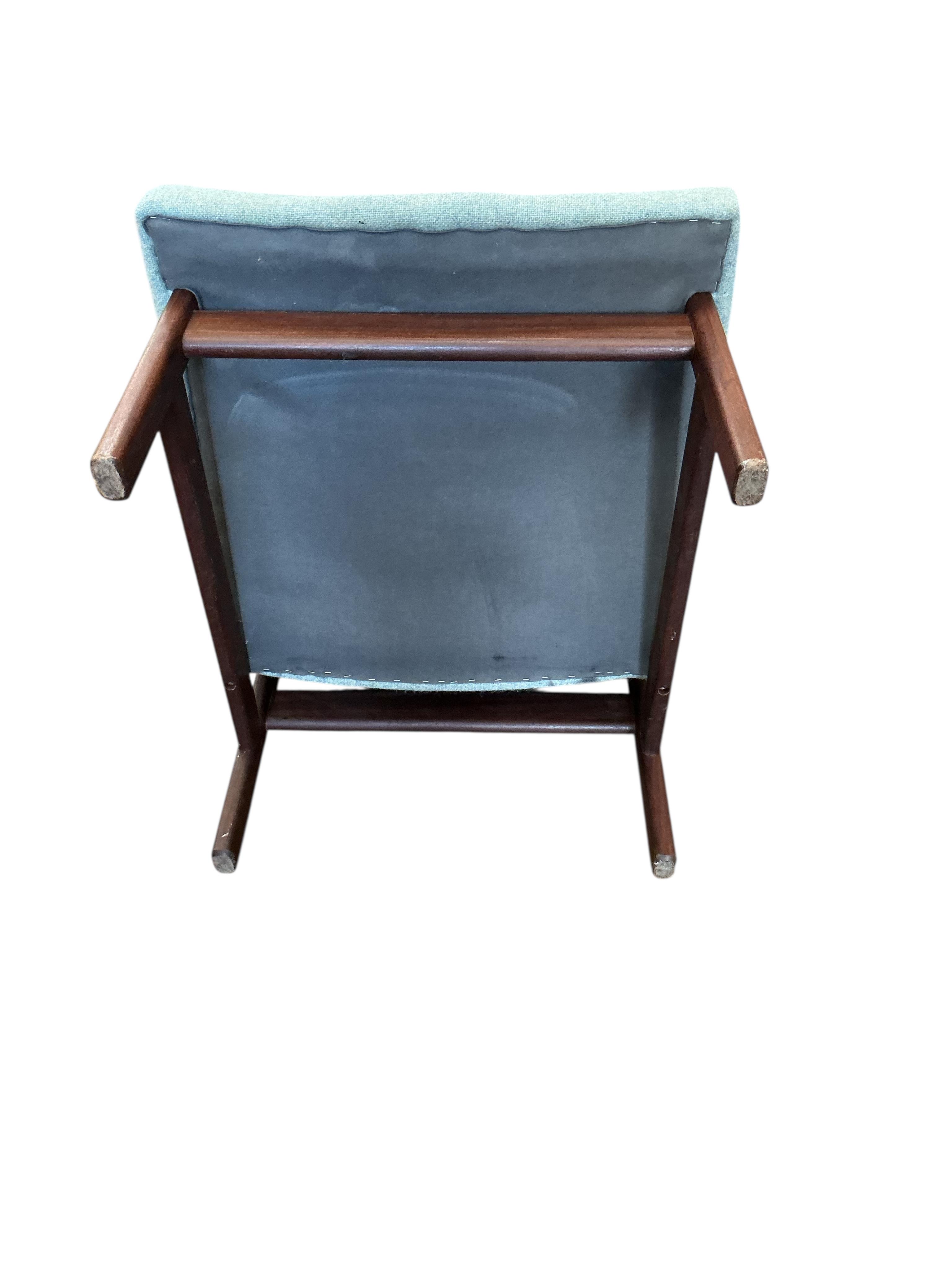 An Afromosia cocktail chair in a Danish style, width 55cm, depth 60cm, height 78cm
